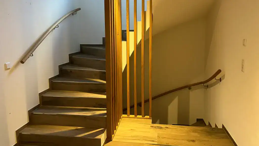 PLANHAK Referenz Wohnhaus Pinzgau NH-Interieur Design Treppe